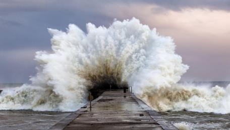 Ocean Fury Unleashed at the Pier wallpaper