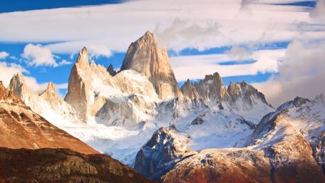 Majestic Mountain Peaks Under a Stunning Sky wallpaper