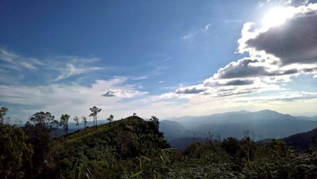 Breathtaking Mountain Vista Under Blue Sky wallpaper