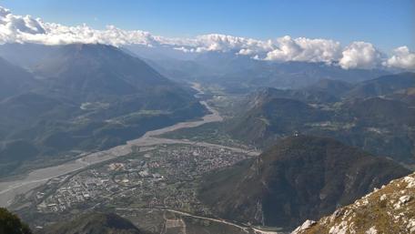 Breathtaking Mountain Cityscape View of Town and Forests wallpaper