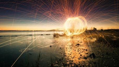 Radiant Patterns Over Calm Waters wallpaper