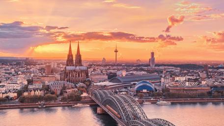 A Majestic European Cityscape at Sunset wallpaper