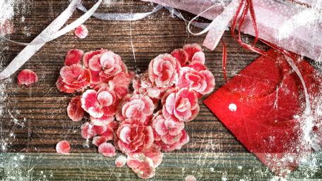 Romantic Heart Shaped Petals on Wood Surface wallpaper