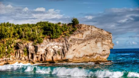Serene Coastal Landscape with Waves and Rocks wallpaper