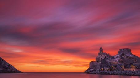 Vibrant Sunset Over Portovenere's Ruins wallpaper