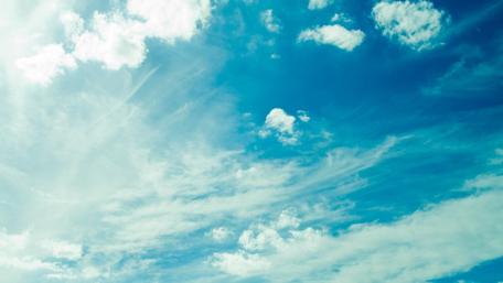 Vast Blue Sky with Fluffy Clouds wallpaper