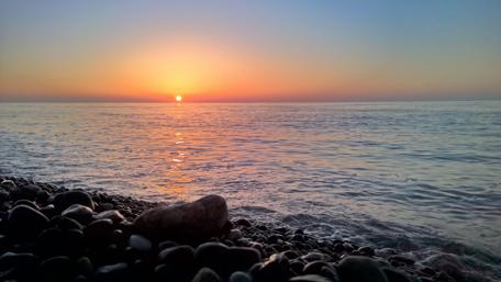 Serene Sunset Over Batumi's Black Sea Coastline wallpaper