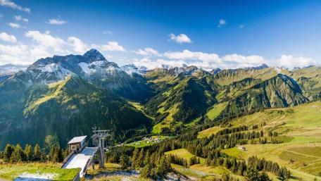 Majestic Mountain Panorama Under a Clear Blue Sky wallpaper