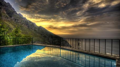 Tranquil Poolside Serenity at Dusk wallpaper