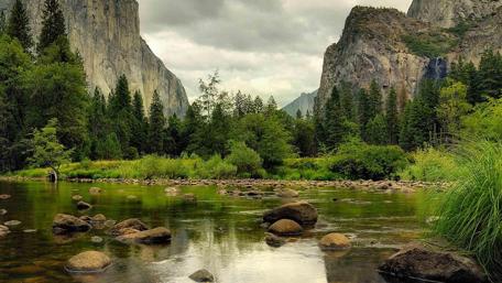 Serene Lake View Surrounded by Majestic Cliffs wallpaper