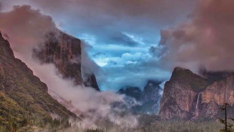 Mysterious Fog Embracing the Mountains wallpaper