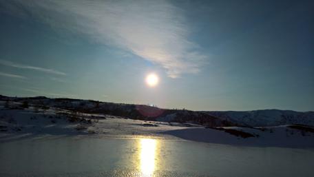 Majestic Winter Sunrise Over Norwegian Landscape wallpaper