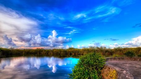 Serene Sky Over Tranquil Lake wallpaper