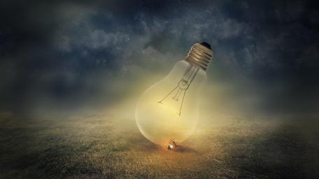 Enchanted Light in a Mystical Field wallpaper