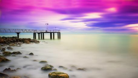 Serene Seashore Sunset Colors wallpaper