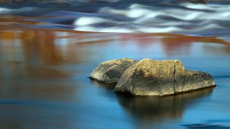 Serenity of Flowing Water and Stones wallpaper