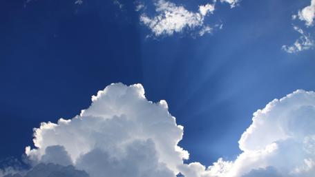 Heavenly Sunrays Through Clouds in 4K Clarity wallpaper