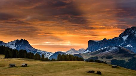 Sunset Over Majestic Snowy Mountains wallpaper