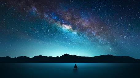 Starry Night Over Serene Mountain Lake wallpaper