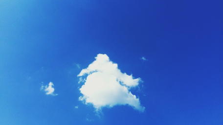 Serene Blue Sky with Fluffy Clouds wallpaper