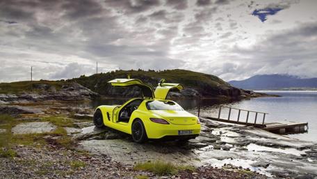 Vibrant Mercedes Benz AMG Near Serene Waterway wallpaper