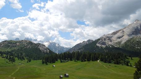Breathtaking Dolomites Under Dramatic Clouds wallpaper