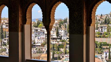 Stunning Cityscape Through Intricate Arches wallpaper