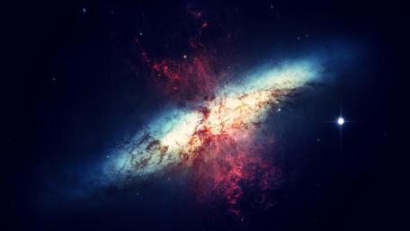 Celestial Collision in Vivid Hues wallpaper