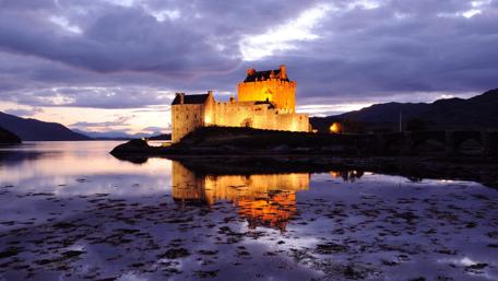 Mystical Castle at Twilight Over Water wallpaper