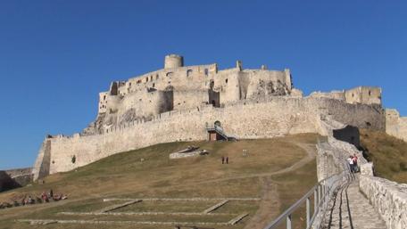 Majestic Spis Castle Against the Clear Blue Sky wallpaper