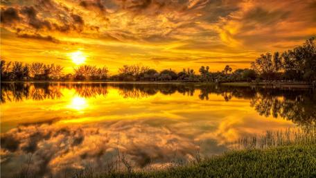 Golden Sunset Over Tranquil Lake wallpaper
