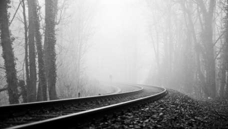 Misty Railway Curve in the Forest wallpaper