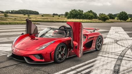 Red Koenig Roadster on Open Runway wallpaper