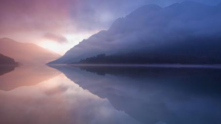 Twilight Serenity Over Misty Mountains wallpaper