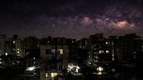 Starry Night Over Dhaka City Skyline wallpaper