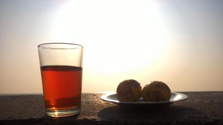 Serene Tea and Sunset Moments wallpaper