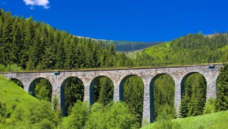 Beautiful Viaduct Surrounded by Lush Greenery in Slovakia wallpaper