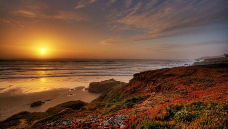 Serene Sunset Over Coastal Landscape wallpaper