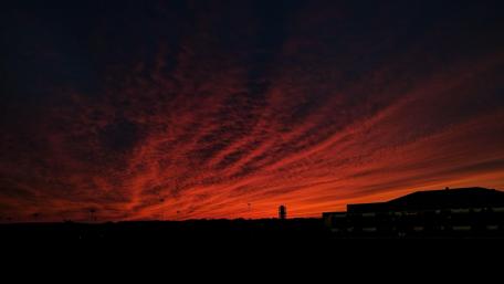 Fiery Night Sky Illuminating Shadows wallpaper