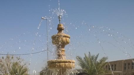 Refreshing Fountain in a Sunny Day wallpaper