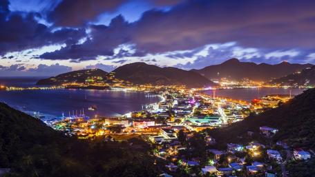 Glowing City Lights Over the Bay at Night wallpaper