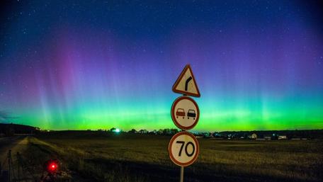 Aurora Borealis Illuminating the Night Sky wallpaper
