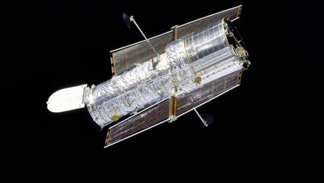Hubble Space Probe Capturing Cosmic Wonders wallpaper