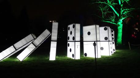 Giant Dominoes Illuminate the Night Sky wallpaper