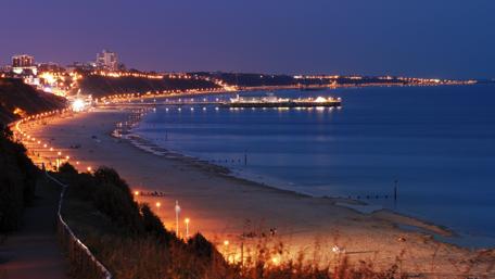 Bournemouth Beach at Night under Starlit Sky wallpaper