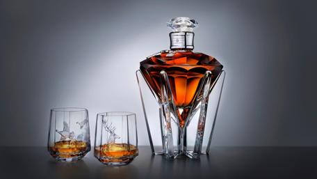 Elegant Tequila Display with Crystal Glasses wallpaper
