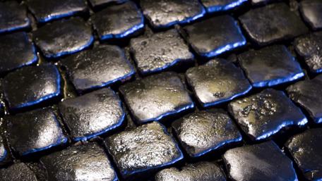 Smooth Cobblestones in Abstract Darkness wallpaper