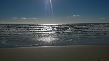 Sunlit Waves at the Seashore wallpaper