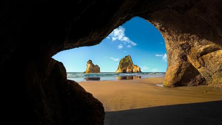 Natural Seaside Cave View in 4K wallpaper