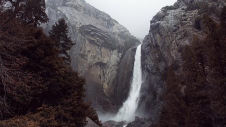 Mystical Waterfall in a Rocky Gorge wallpaper